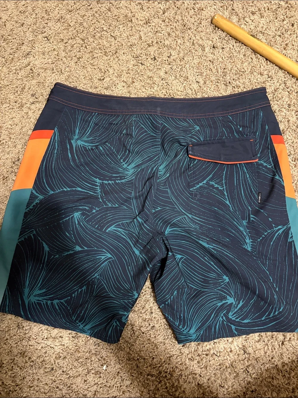 O'Neill Navy Swim Board Shorts with Teal Wave Print and Orange Accents